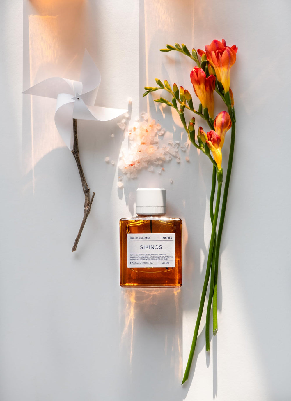 KORRES Sikinos base notes feature cedarwood and sandalwood with musk for warmth.