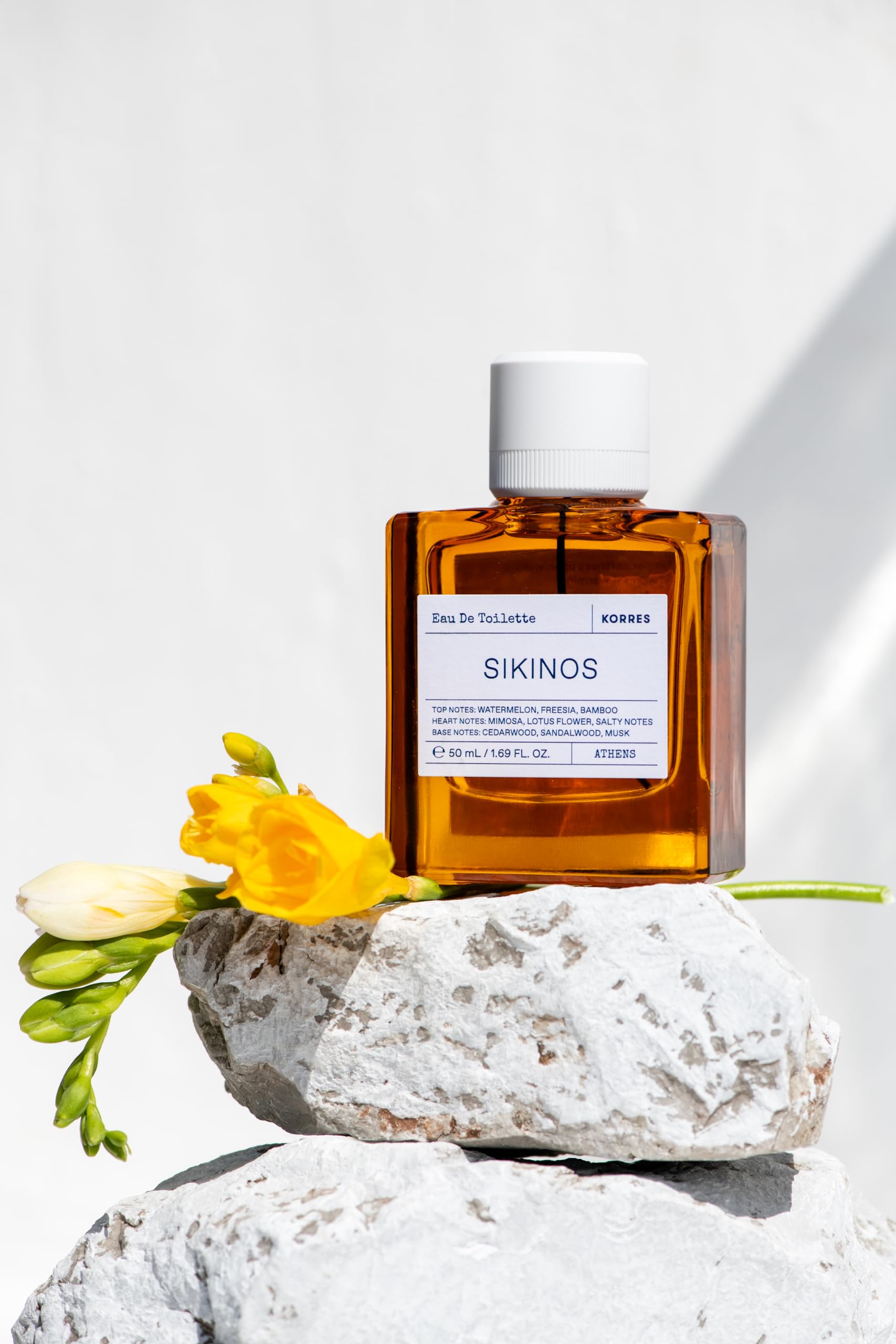 KORRES Sikinos packaging shows a travel-friendly 1.69 fl oz bottle.