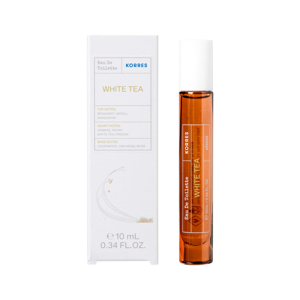 KORRES White Tea EDT spray in hand for effortless office-to-evening wear.
