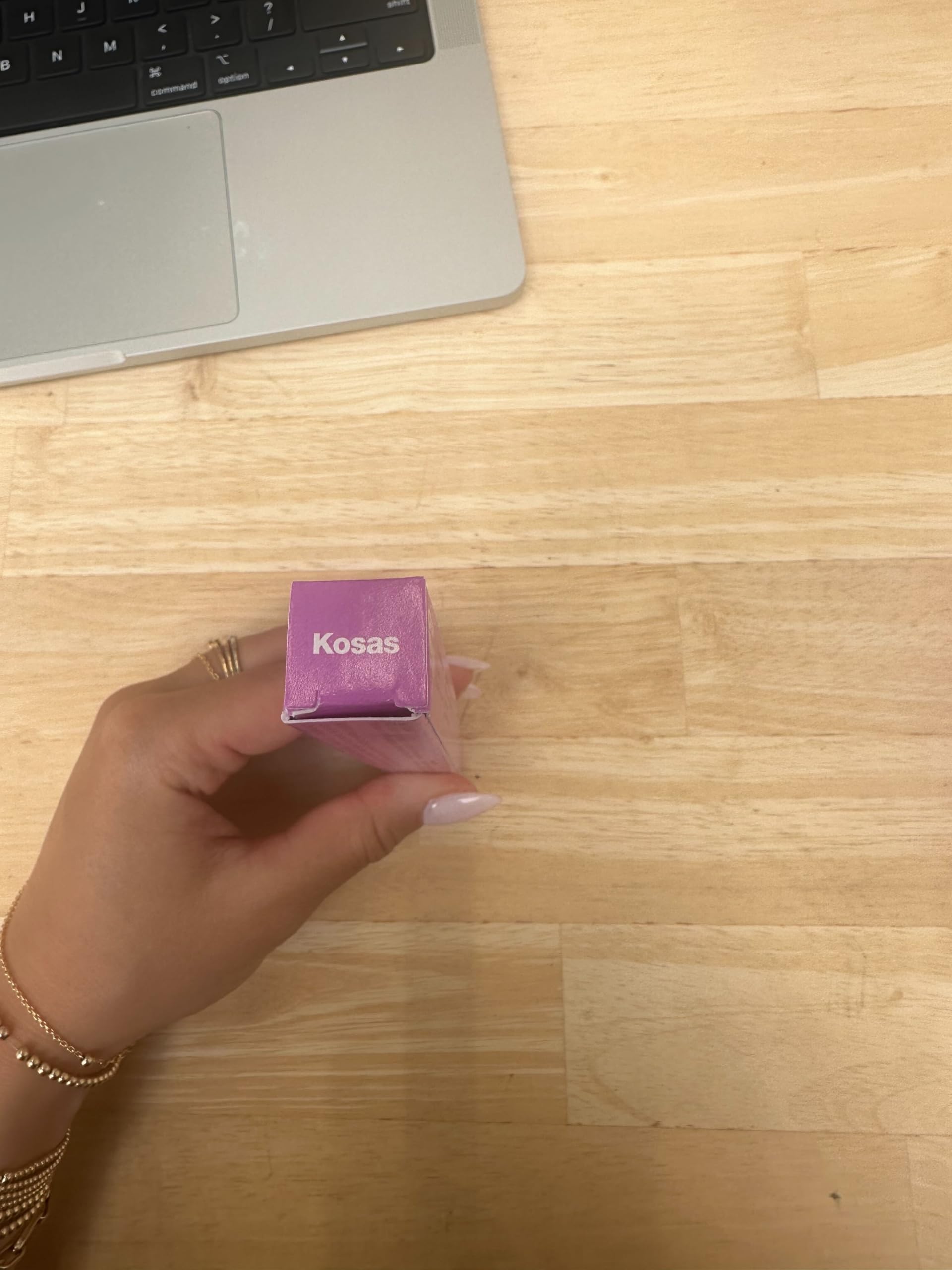 Kosas Brow Pop packaging close-up highlights portable brow tool.