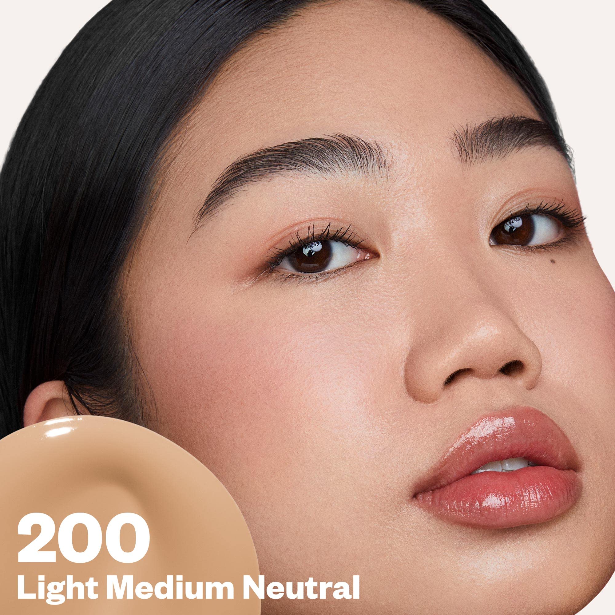 Kosas Revealer swatch on arm demonstrates medium coverage with glow.