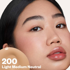 Kosas Revealer swatch on arm demonstrates medium coverage with glow.
