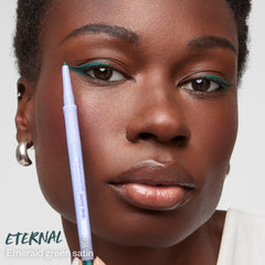Kosas Soulgazer emerald-green satin swirl shows creamy glide and pigment.