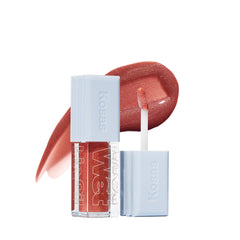 Kosas Wet Lip Oil Gloss bottle close-up highlights hydration and smooth application for daily wear.