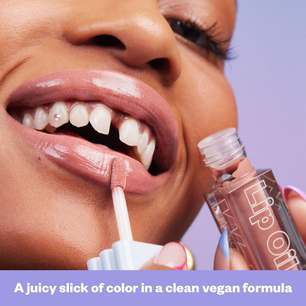 Kosas Wet Lip Oil Gloss layers for more color payoff or wears solo as a sheer gloss