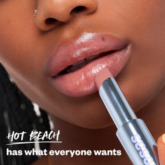 Kosas Wet Stick highlights ceramides and hyaluronic acid soothing lips.
