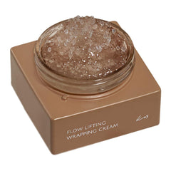 KOY Flow lifting-wrapping cream bottle close-up shows hydration and radiance.