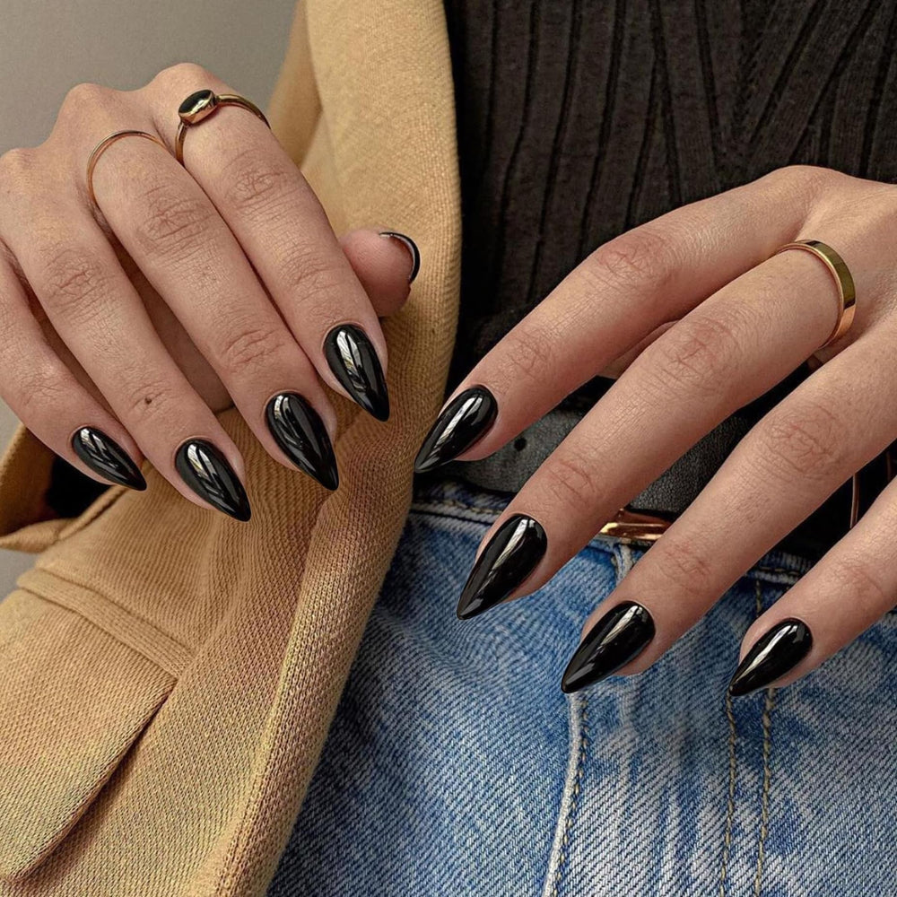 Close-up of KQueenest All Black nails showing smooth color and UV coating