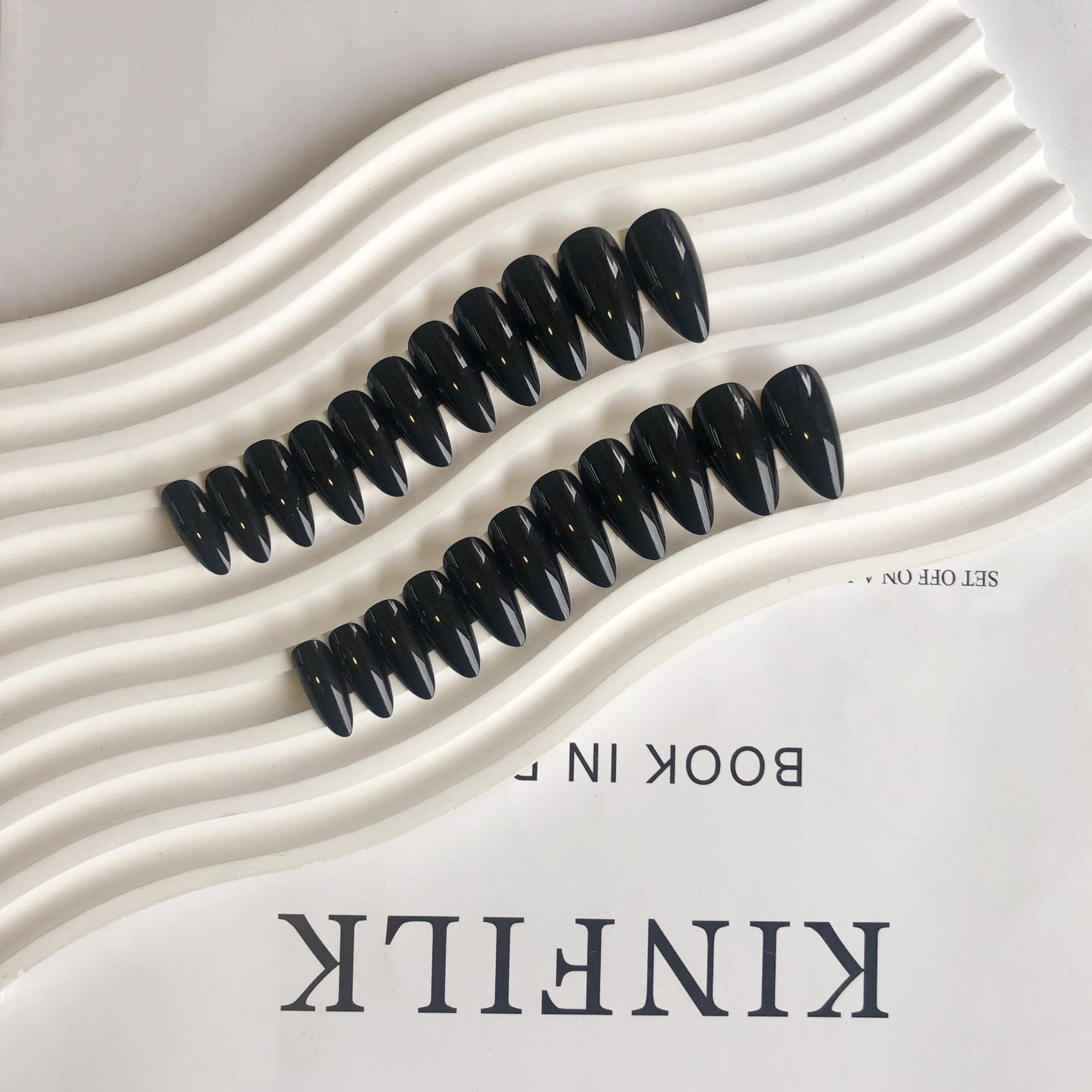 KQueenest press-on nails in use showing fast five-minute application with glue and tabs