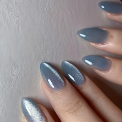 KQueenest cat eye nails almond baby blue set with glitter finish for a chic look.