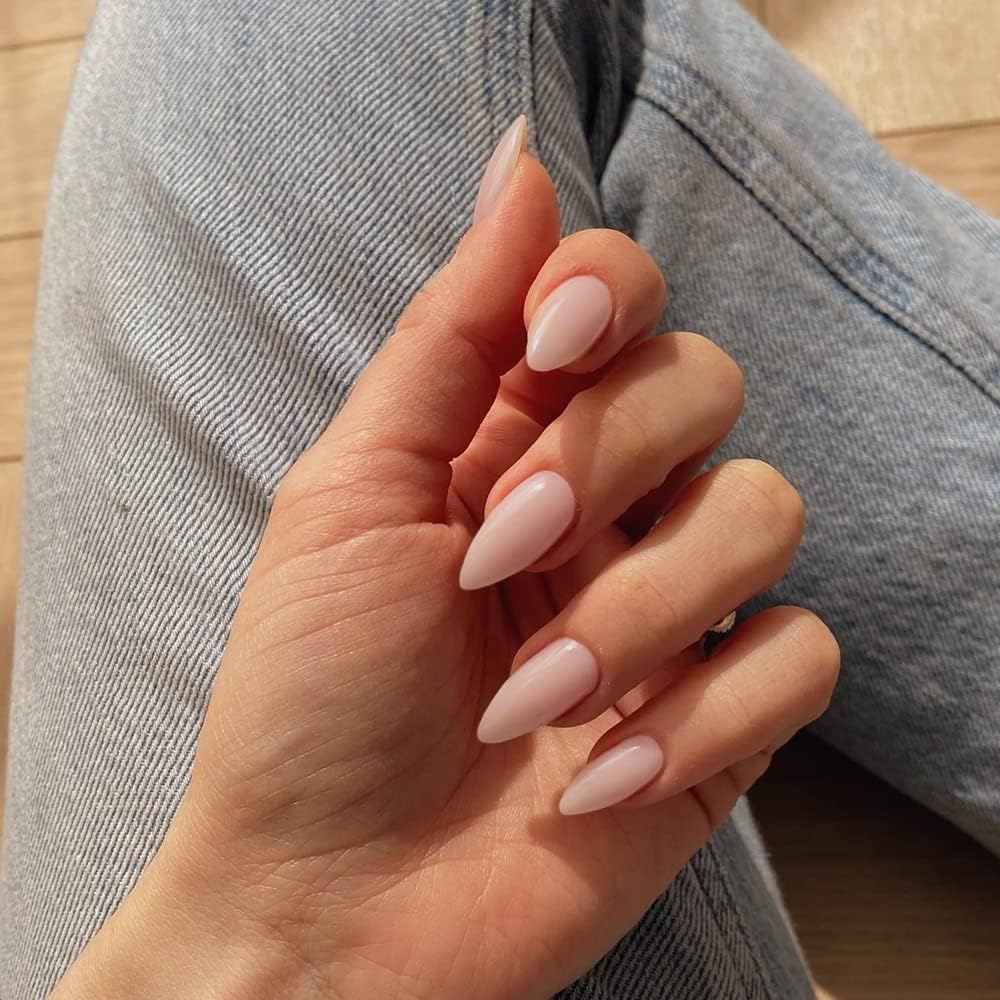 KQueenest almond shaped nails close up highlighting smooth surface finish.