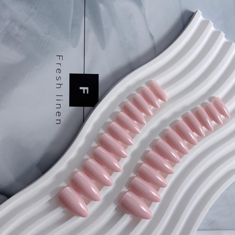 KQueenest reusable dusty pink nails with glue on option for secure wear.