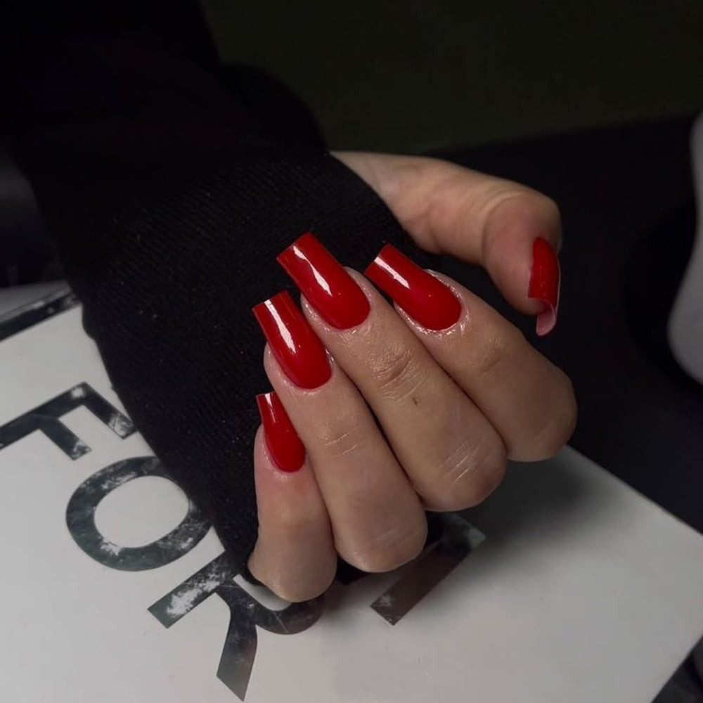 KQueenest red press on nails close up highlights durable gel glue for lasting wear.