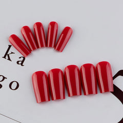 KQueenest red press on nails on hand showcase a glossy, ready to wear look.