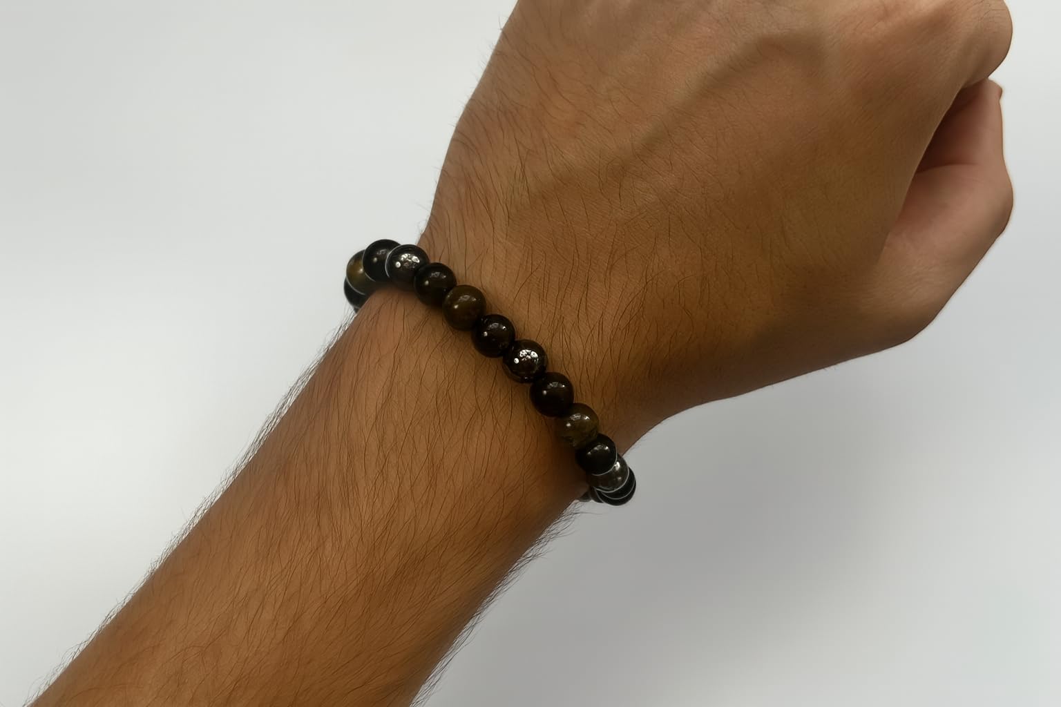 KRAMARE adjustable bracelet fits most wrists with a sleek finish.