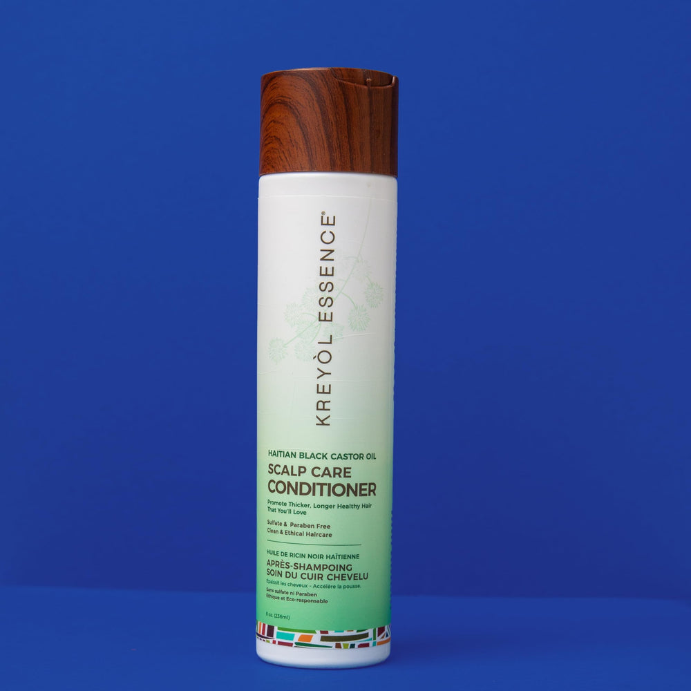 Demonstration of routine applying conditioner to wet hair for scalp care.