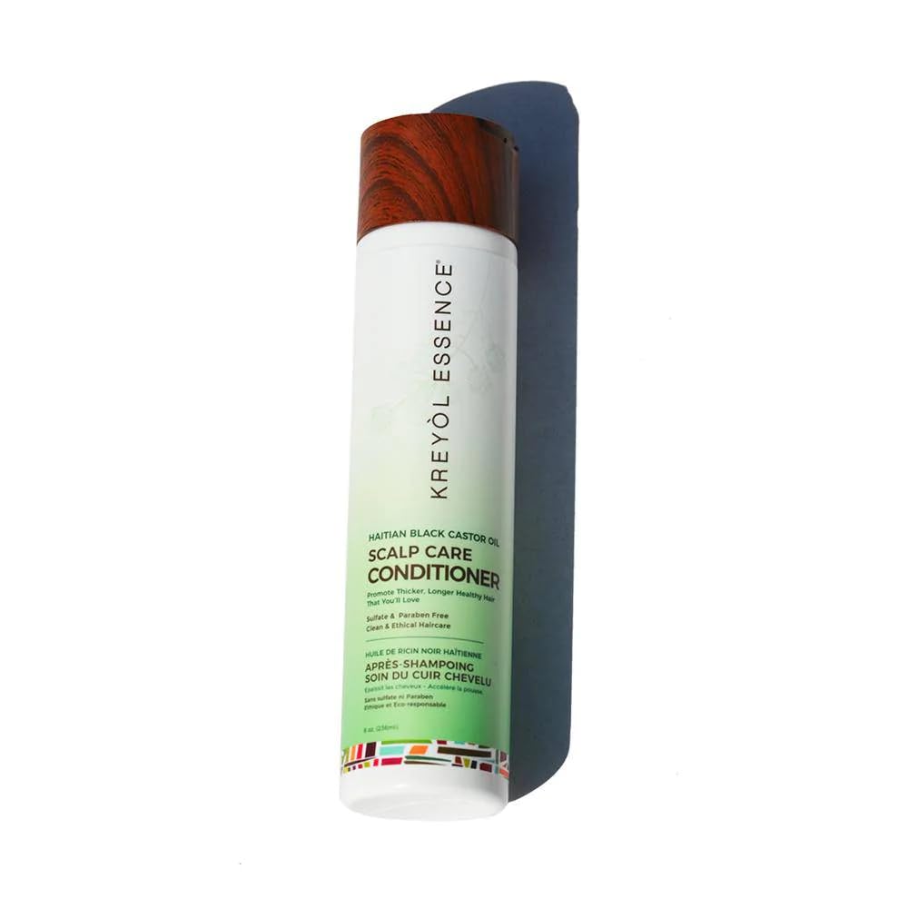 Creamy conditioner texture on hand for detangling and smooth application.