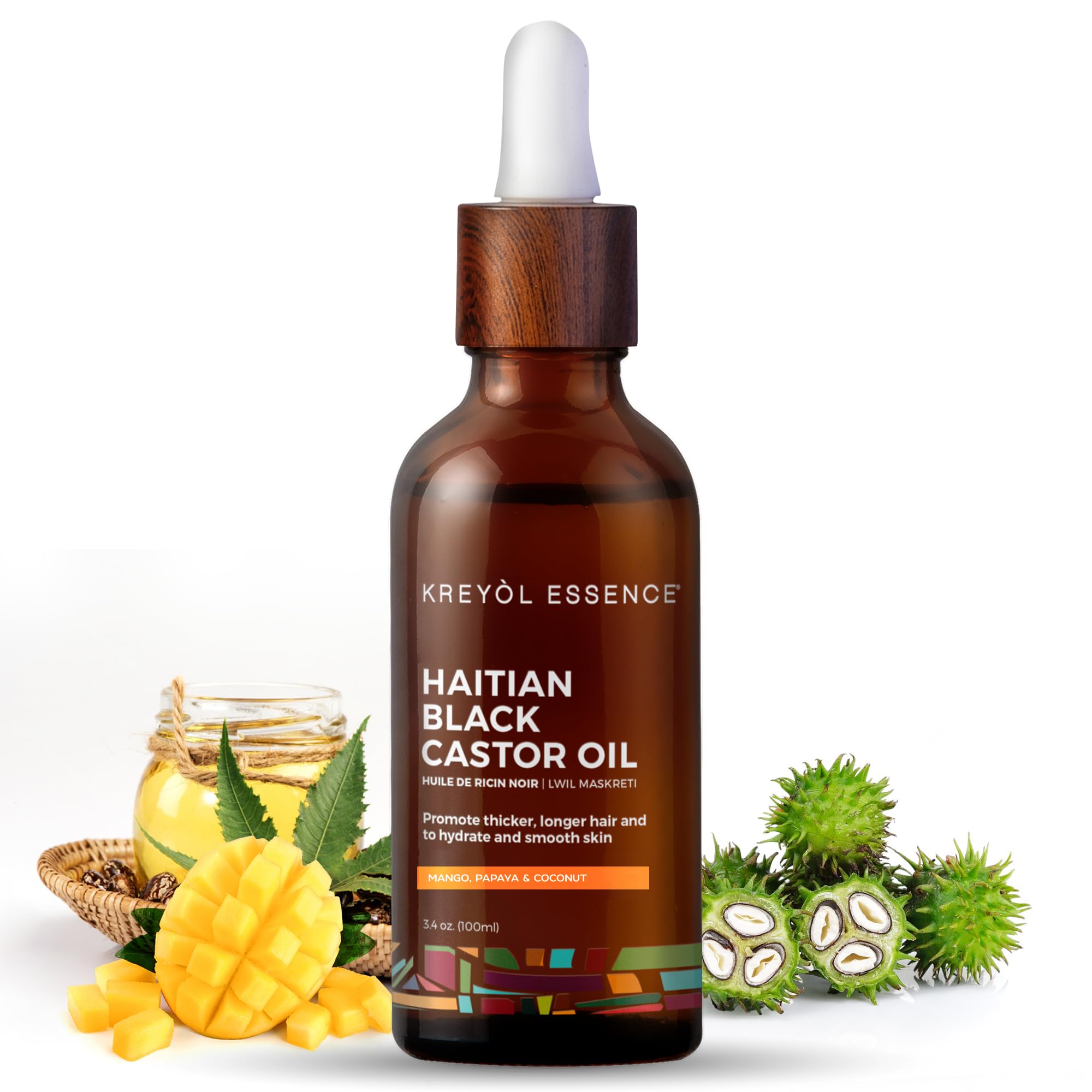 Kreyol Essence Haitian Black Castor Oil bottle shown for deep moisture and fuller-looking hair.