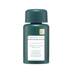 Kristin Ess Anytime Anywhere Scalp and Hair Milk Oil bottle pouring for hydrated scalp.