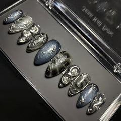 KRTBKR goth press on nails in medium almond for quick at-home manicure