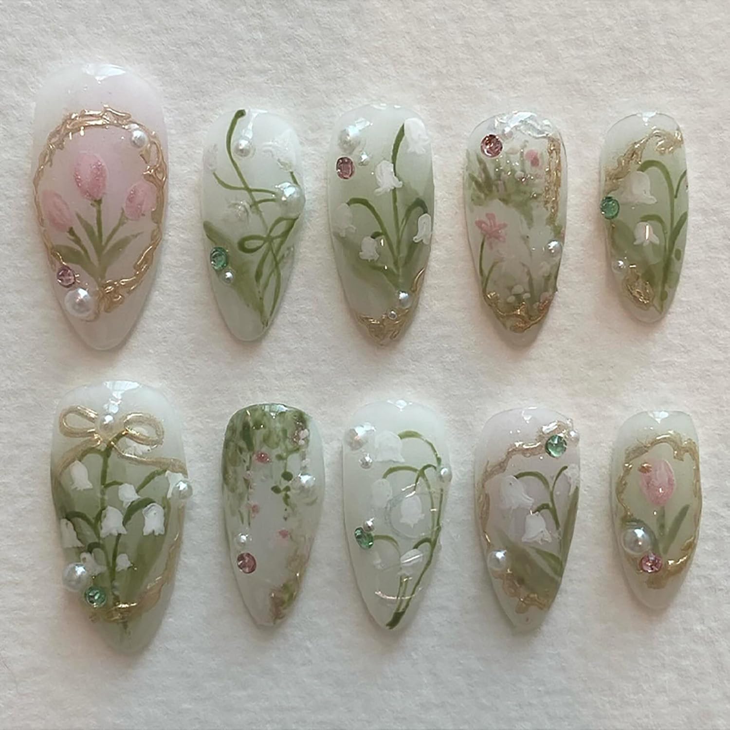 KRTBKR Green Press on Nails in almond shape for quick, salon-style manicures.