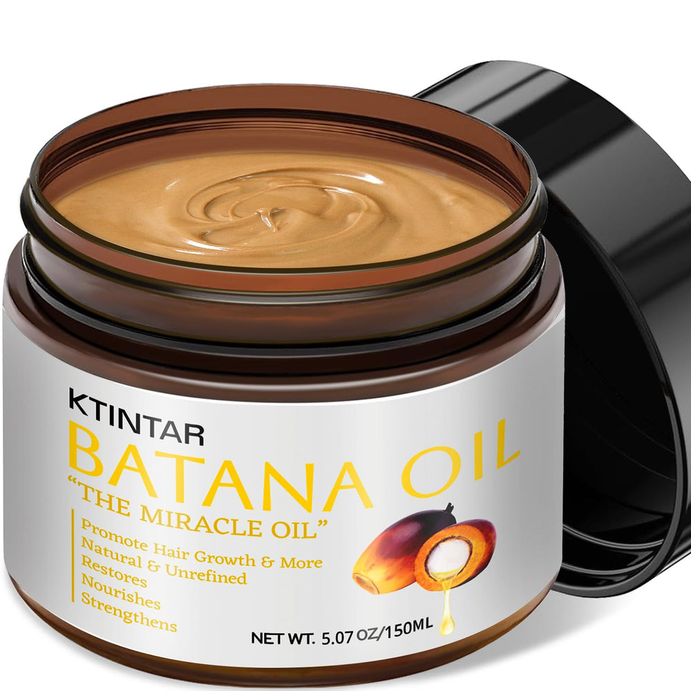 Ktintar Batana Oil on palm for easy scalp nourishment