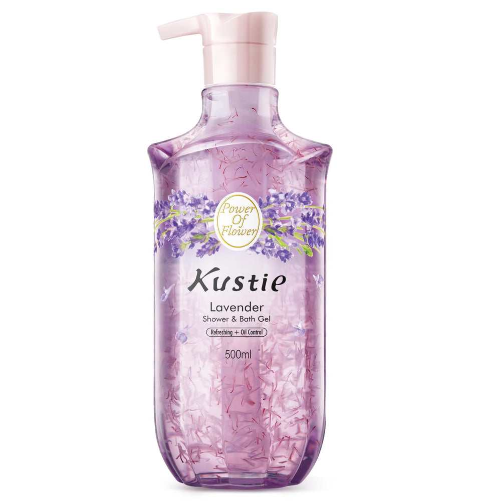 Kustie Lavender Petal Body Wash bottle pours with visible petals for an oil-balancing cleanse.