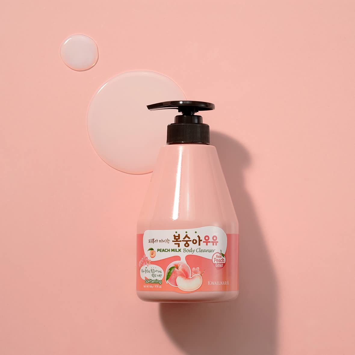 Kwailnara Peach Milk Body Wash in a shower scene with creamy lather on skin.