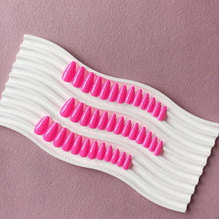KXAMELIE adhesive-tab nails being applied for quick, mess-free wear