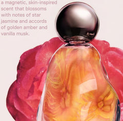 Kylie Cosmetics Cosmic bottle shows amber-vanilla heart notes through glass