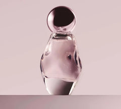 Kylie Cosmetics Cosmic Eau de Parfum bottle close-up highlighting amber floral notes