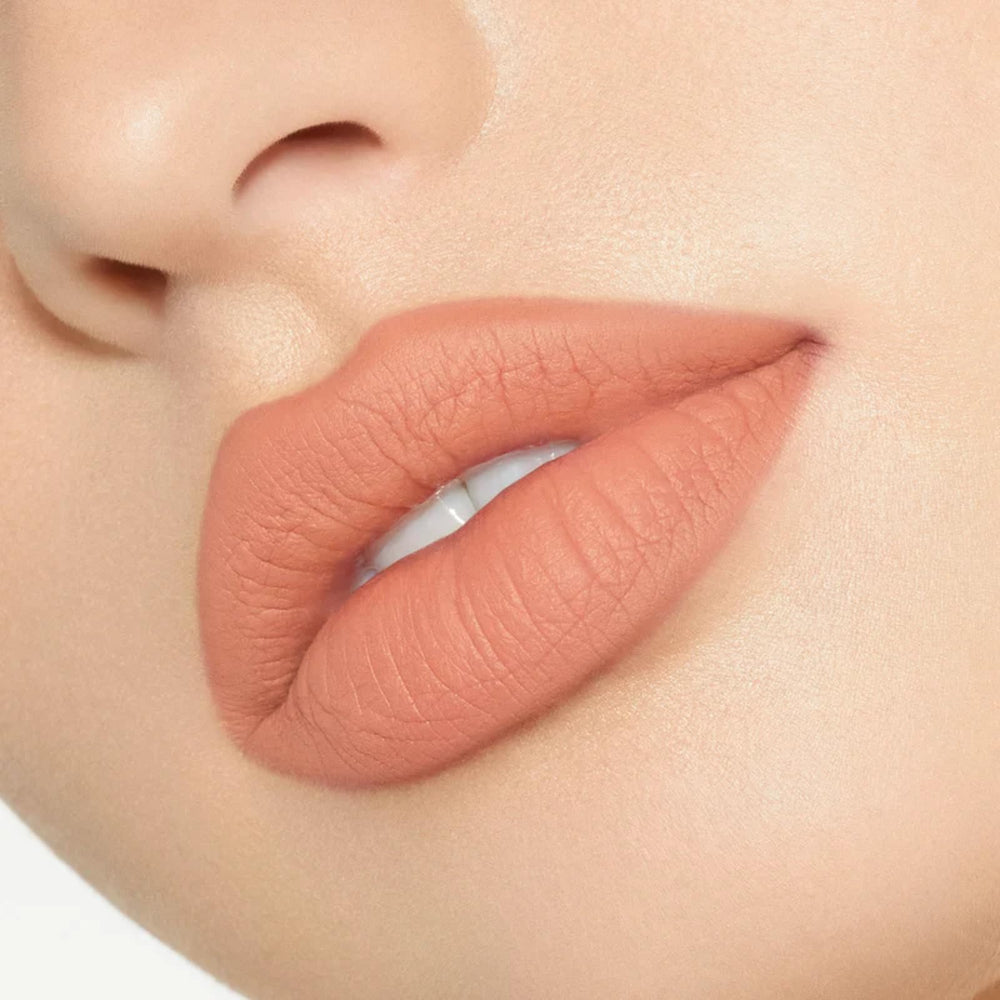 Kylie Cosmetics applicator delivering precise, mess-free lipstick application.