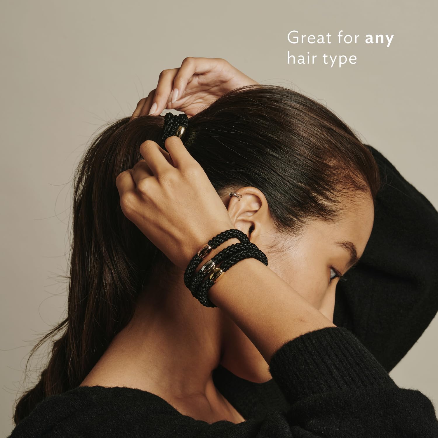 Sleek black bead finish on L. Erickson ponytail holders.