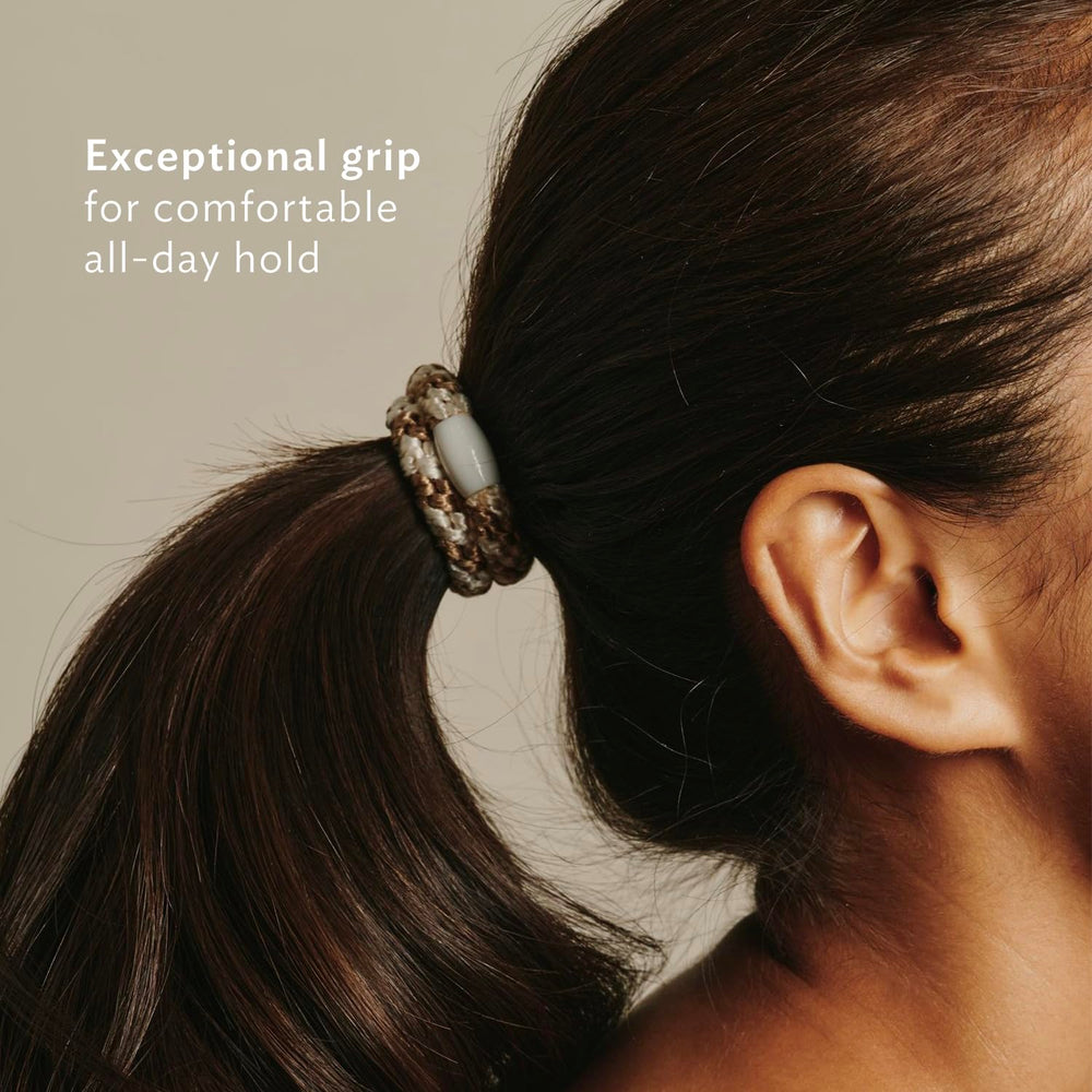 L. Erickson thick 3/8-inch bands secure heavy ponytails without creasing.