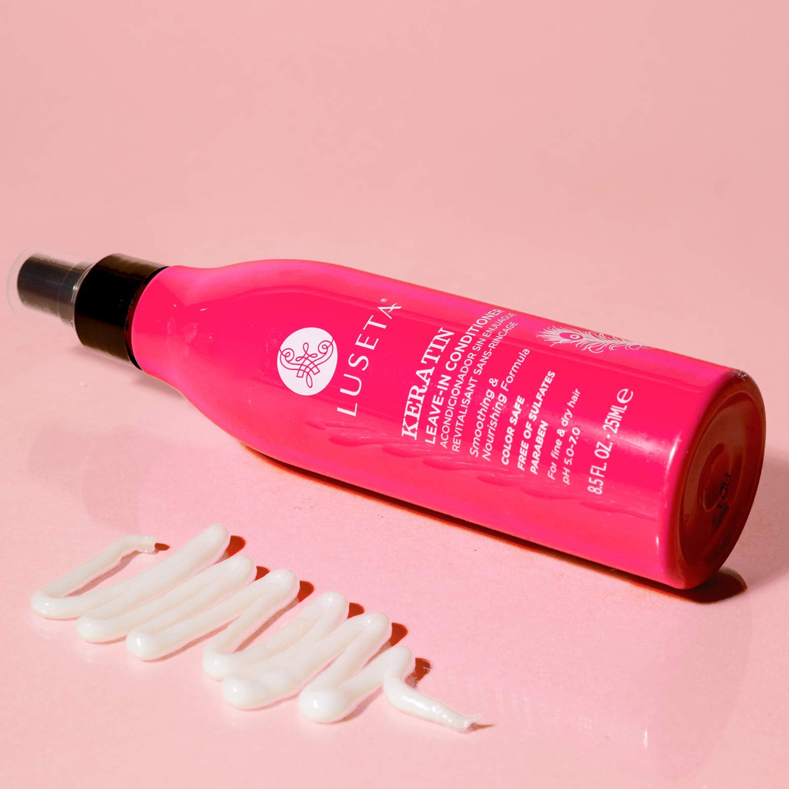 Luseta Keratin Leave-In Conditioner application close-up showing smoothing effect