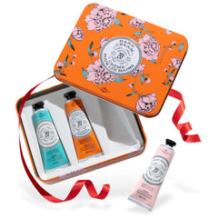 La Chatelaine hand cream trio tin packaging, gift-ready presentation.
