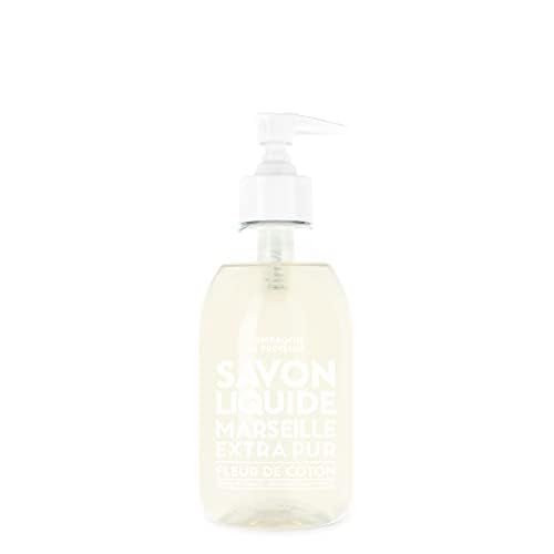 La Compagnie de Provence Cotton Flower bottle in a bright bathroom for daily cleansing.