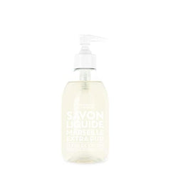 La Compagnie de Provence Cotton Flower bottle in a bright bathroom for daily cleansing.