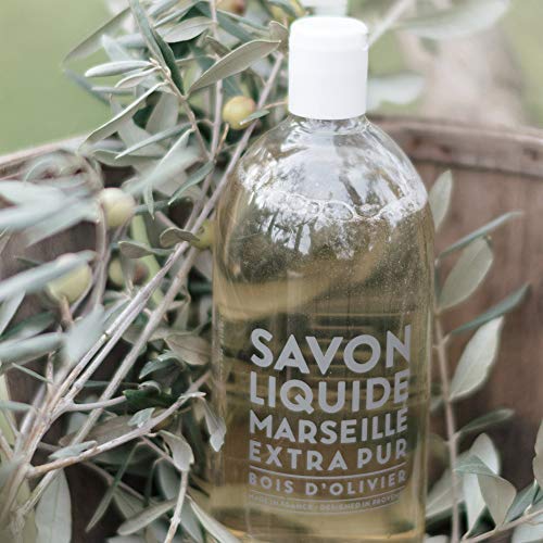 La Compagnie de Provence olive wood soap refill displayed beside kitchen sink for convenience