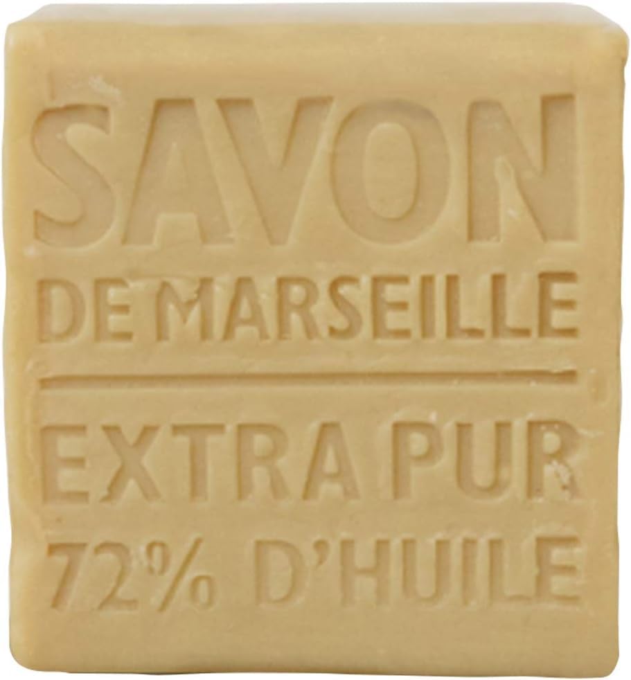La Compagnie de Provence soap cube hand use demonstrates gentle, versatile cleansing for face and body.