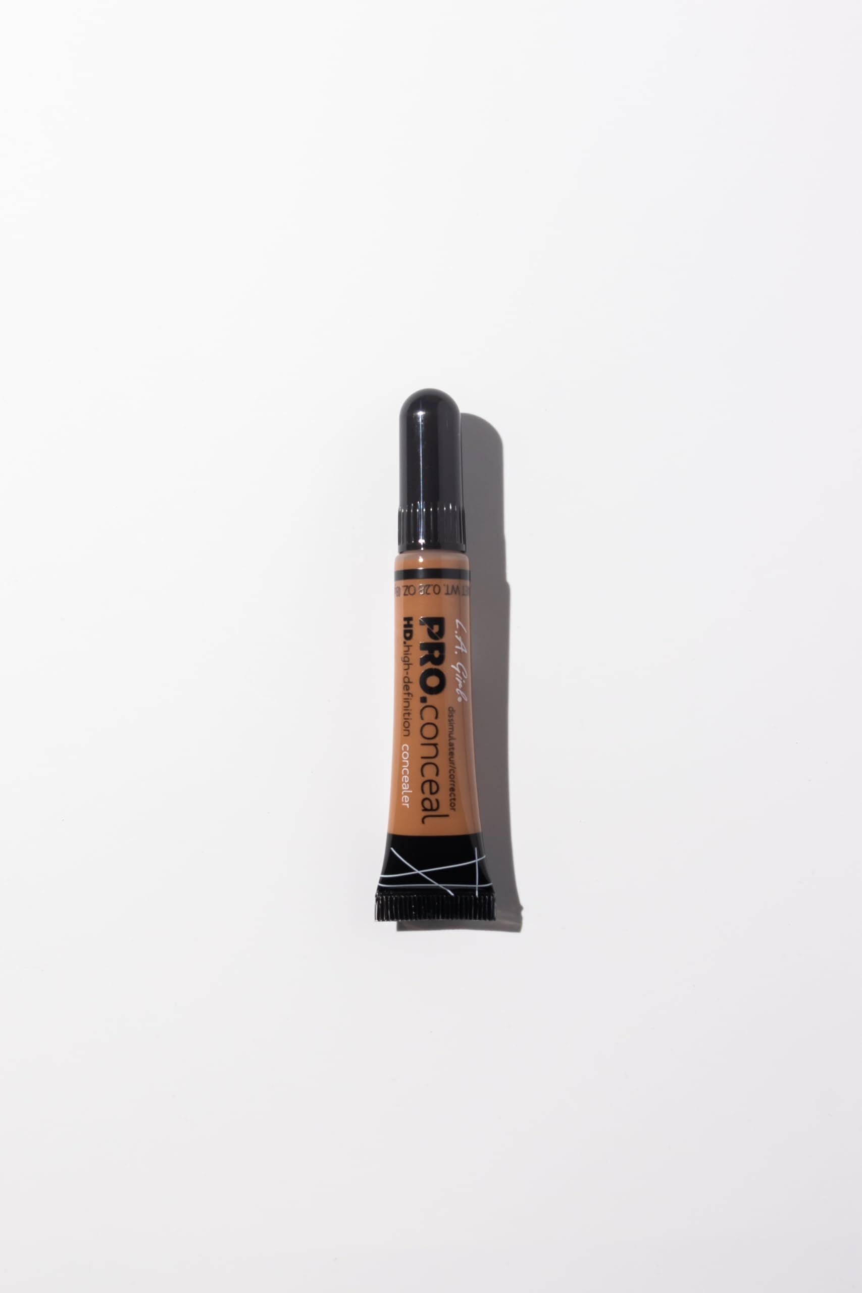Under-eye area covered with discreet, natural-looking concealment.