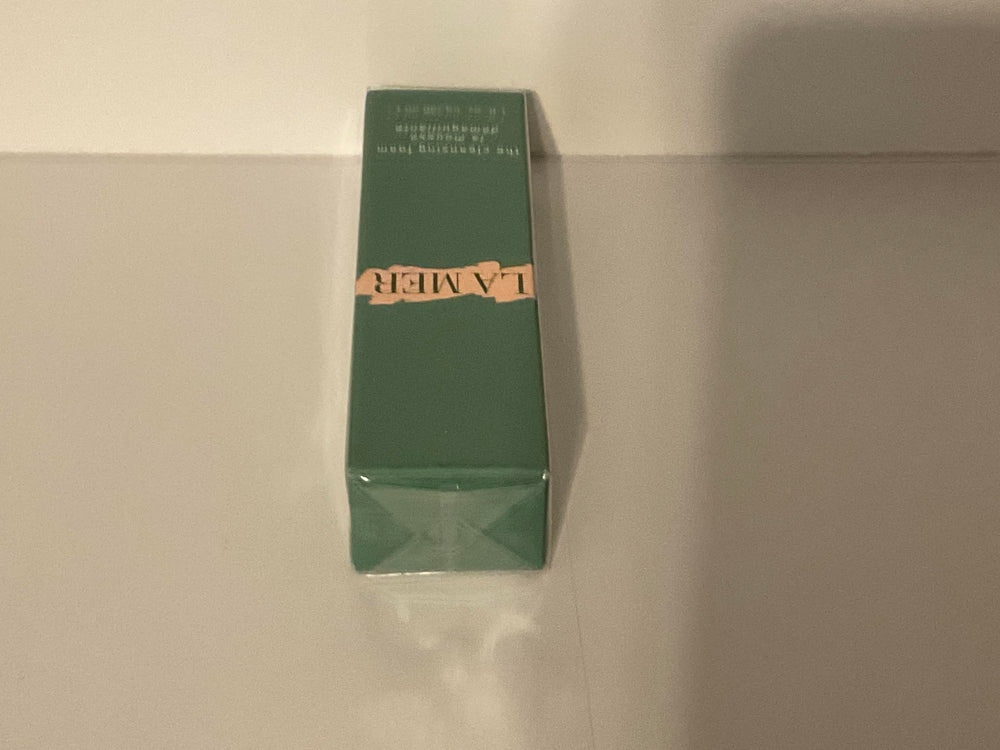 La Mer Cleansing Foam application massage image showing airy foam texture.