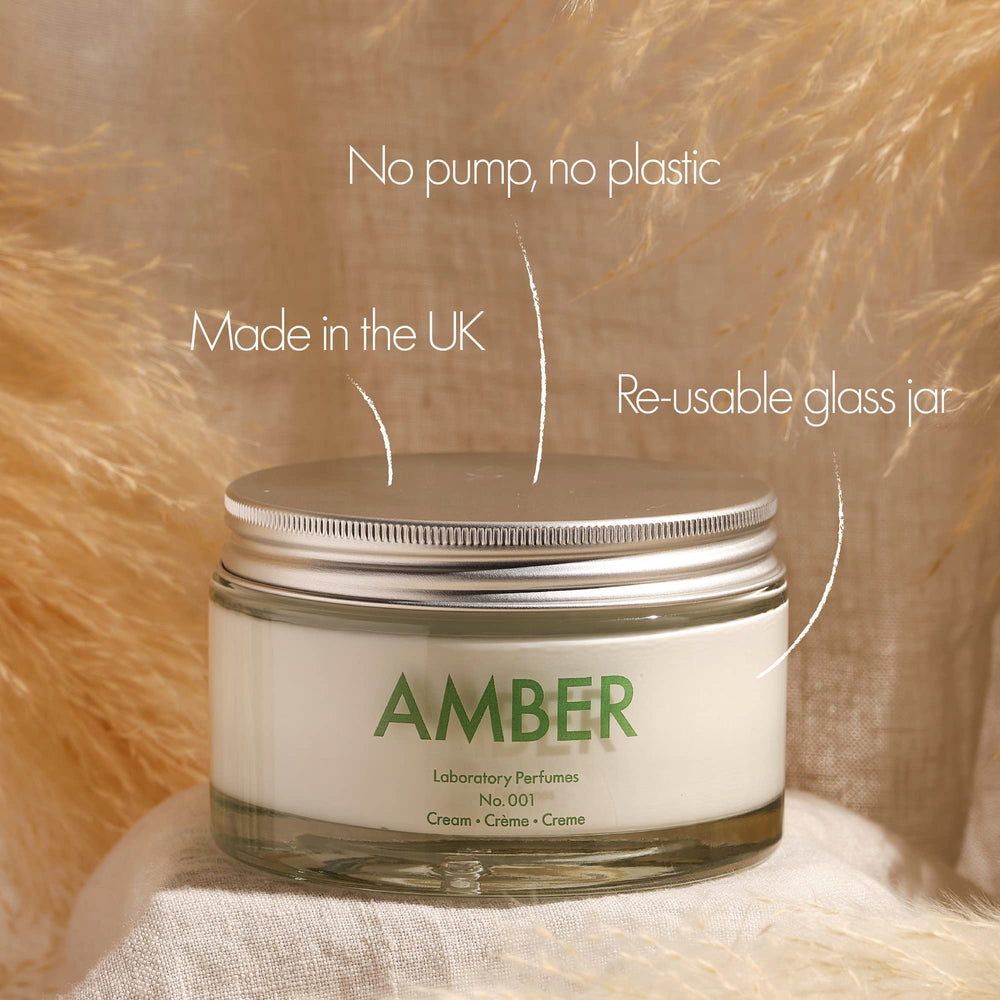 Laboratory Perfumes Amber Body Cream bottle with amber fragrance evokes warm, lasting scent.