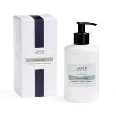 LAFCO New York Feu de Bois hand cream 12oz jar provides intense hydration for dry hands.