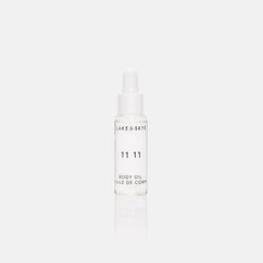 Lake & Skye 11 11 Body Oil Mini bottle showing clean skin musk scent