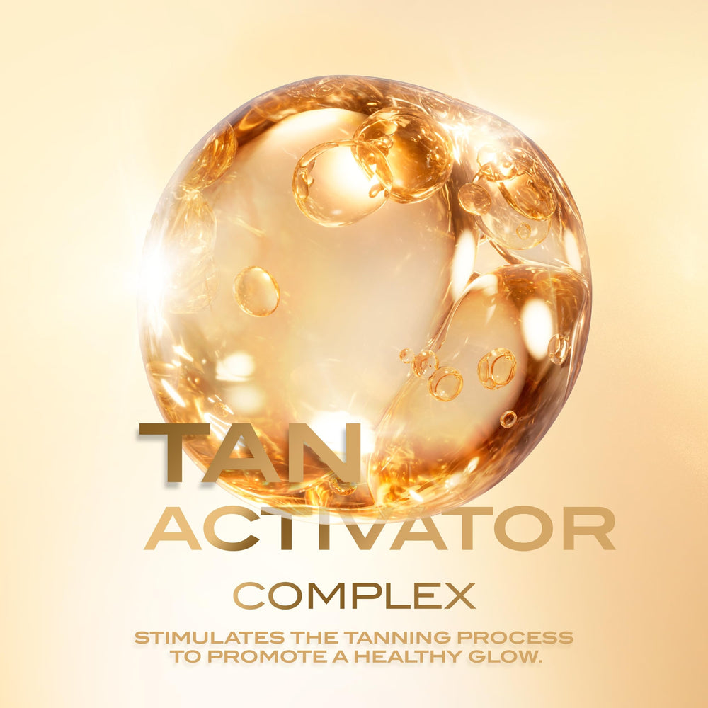 Lancaster Golden Tan Maximizer glow hint for a warm, sun-kissed look.