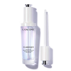 Lanc46me Clarifique bottle pour demonstrates precise release for smoother-looking skin.