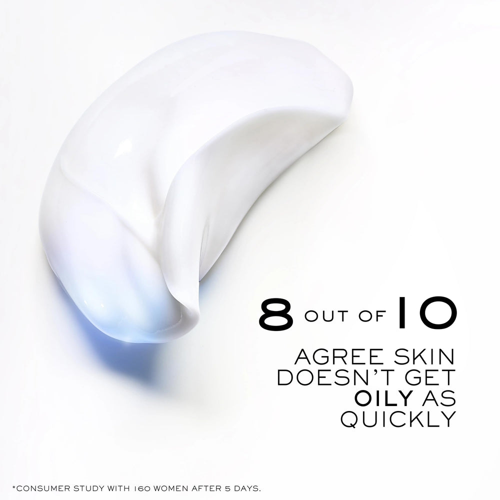 Lancôme Clarifique Milky Cream applied to the face for a glass skin glow.