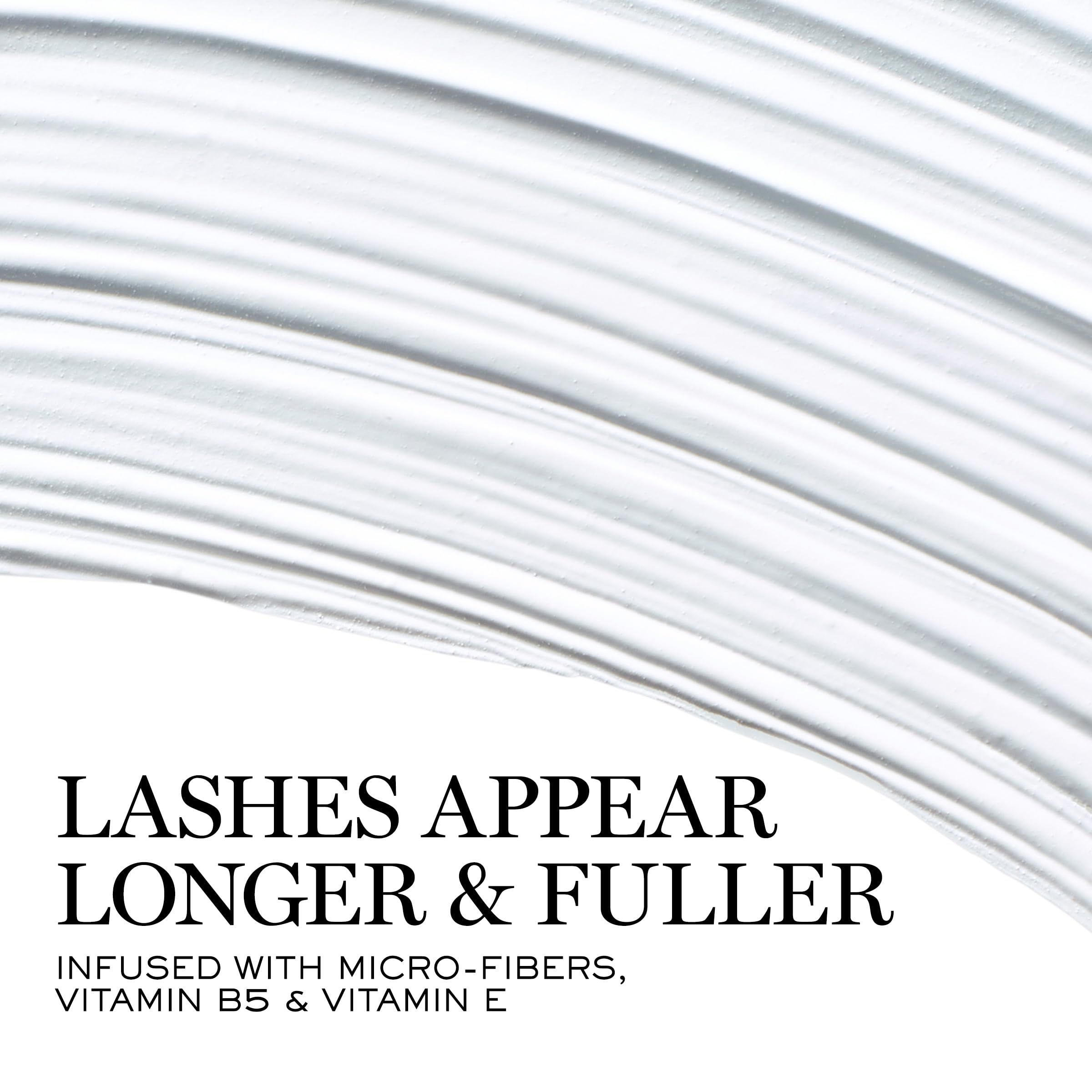 Close-up of curved wand lifting lashes for an open-eye look.