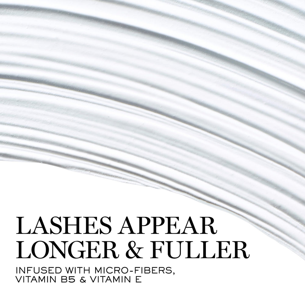Close-up of curved wand lifting lashes for an open-eye look.